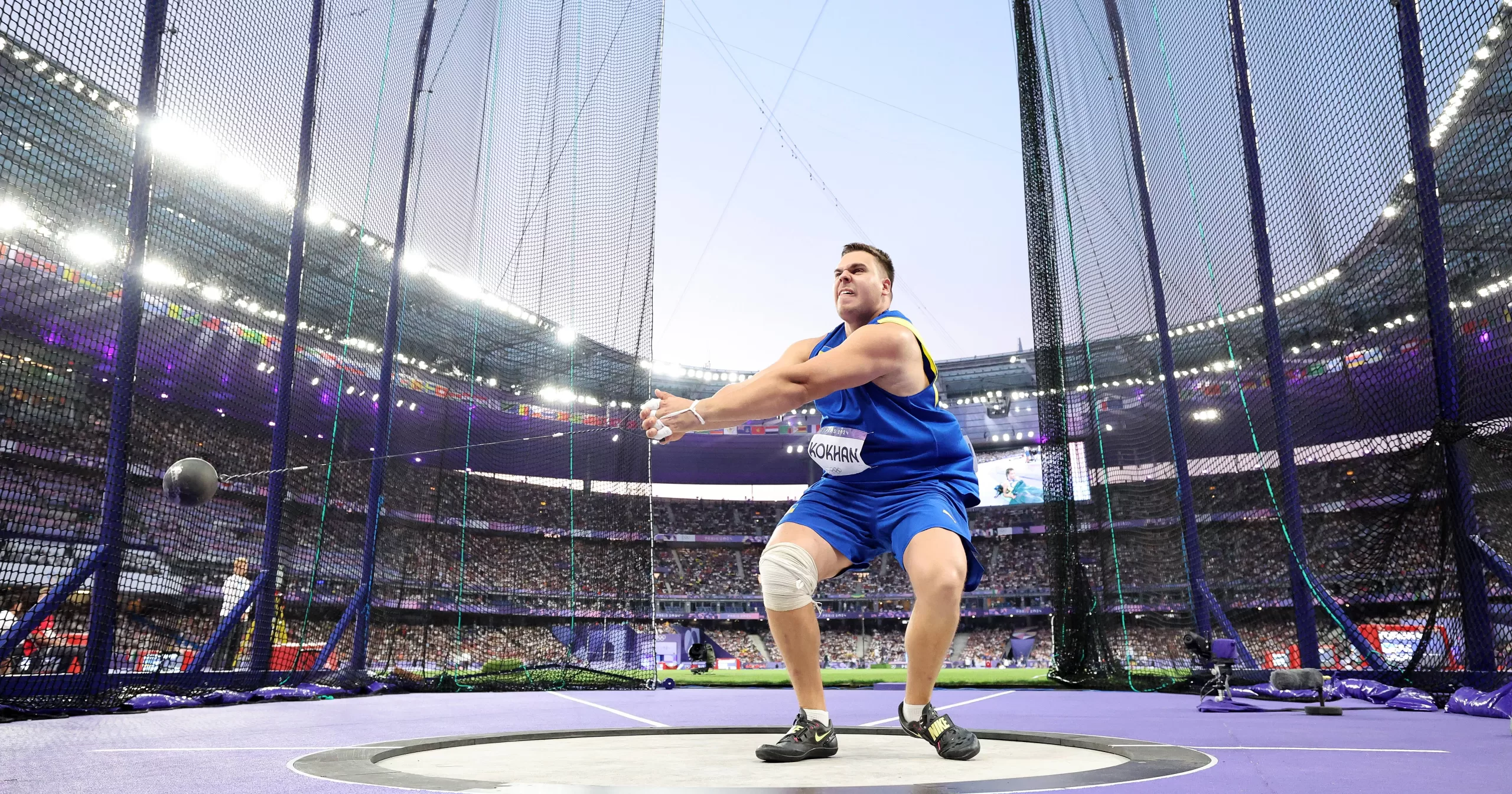 Михаил Кохан во время финальных соревнований по метанию молота на стадионе "Стад де Франс" 04 августа 2024 года в Париже, Франция / Фото Getty Images/Global Images Ukraine