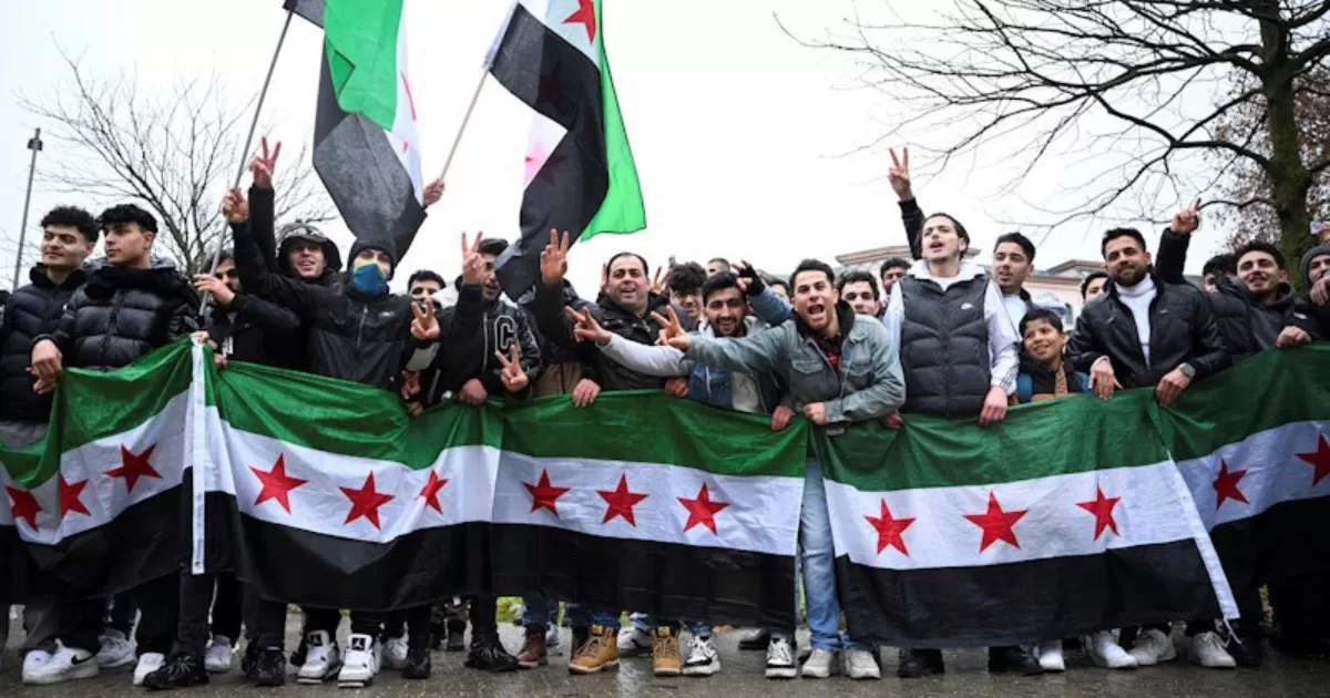 Сирійці в Берліні святкують падіння режиму Асада / Фото Reuters