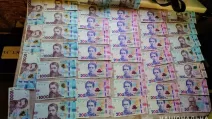 Гроші, викрадені в матері зниклого безвісти військового / Фото: Поліція Дніпропетровської області