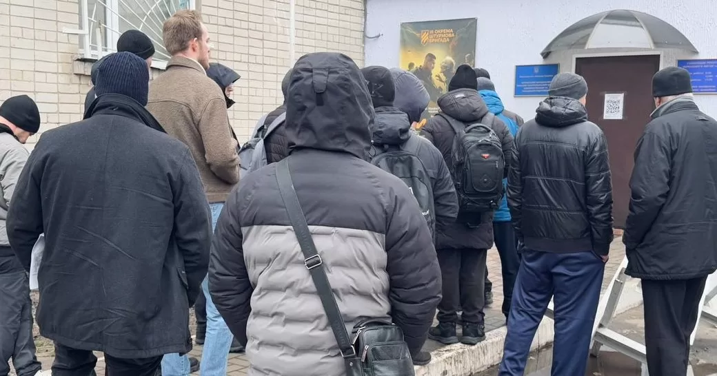 Men in front of the building of the RTCC and SS / Photo by Suspilne