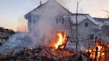 Пожежа після обстрілу Куп'янського району / Фото: Харківська обласна прокуратура