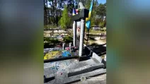 Поліцейські Київщини повідомили про підозру фігурантці за фактом наруги над могилою / Фото поліція Київщини