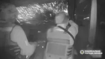 Russian military dropped an explosive device on a police car / Video screenshot