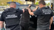 Затримання підозрюваного в організації схеми для ухилянтів / Фото: СБУ