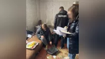 Затримання підозрюваної в шахрайстві / Фото: Поліція Львівської області
