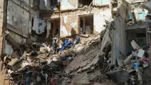 Rescuers dismantle the rubble at the site of a rocket attack on Kyiv / Photo: Timur Tkachenko