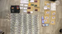 Вилучені під час обшуку гроші / Фото: Офіс Генерального прокурора