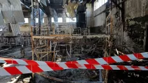 Місце воєнного злочину РФ в Оленівці / Фото: Reuters