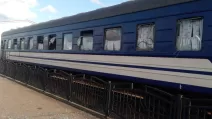 Passenger railroad car damaged by Russian strikes / Photo: Ukrzaliznytsia