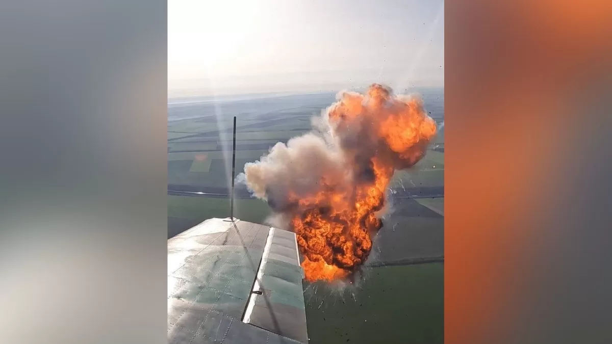 Explosion of a Geran-2 strike UAV after being hit, in close proximity to a Yak-52 interceptor aircraft / Photo from X @NHunter007