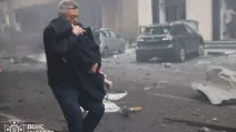 General Volobuev, former head of the main department of the State Emergency Situations Service in Kharkiv region takes a child out of a kindergarten after a Russian kamikaze drone strike / Photo: State Emergency Situations Service