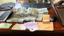 Вилучені у топпосадовців Нацполіції гроші та автівки / Фото: Офіс генпрокурора