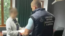 Объявление подозрения горе-матери / Фото: Полиция Харьковской области