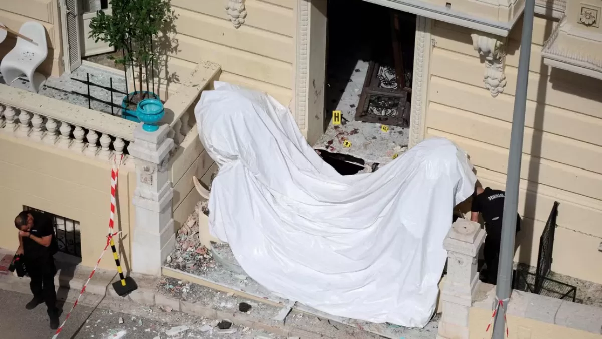 Entrance to the residential building where an explosive device seriously injured three people in Monaco on June 30, 2026 / Photo: AFP