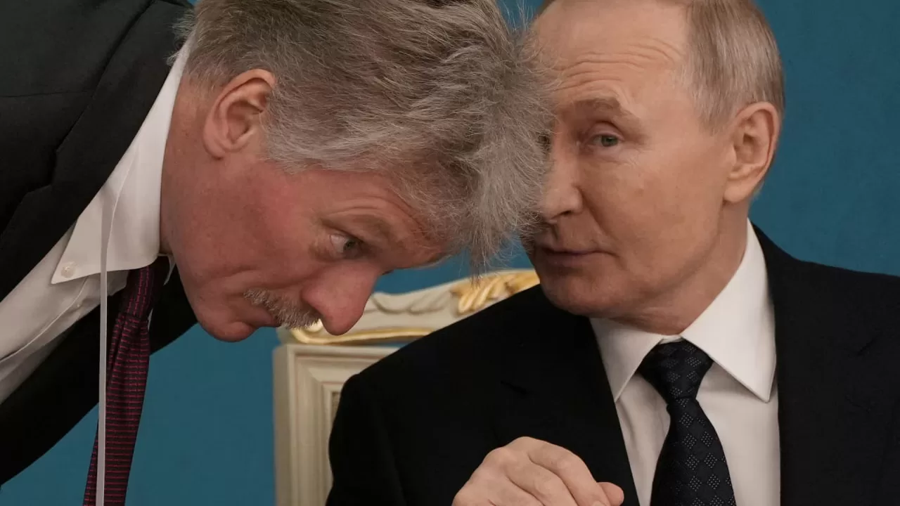 Дмитро Пєсков та Володимир Путін / Фото: Reuters