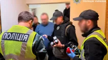 Правоохранители во время следственных действий по делу о незаконной легализации иностранцев / Фото: Полиция Киева
